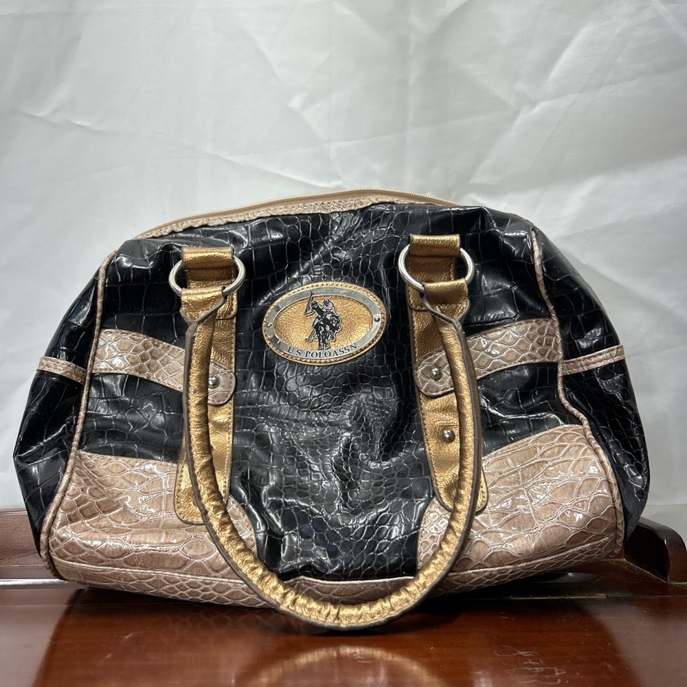 Vintage U.S. Polo Assn. black and beige crocodile-embossed satchel bag.